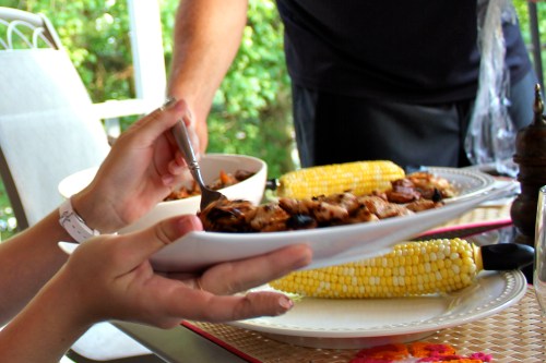 Grilled chicken and corn for an al fresco dinner in summer
